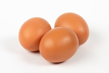 Fresh chicken eggs on white background
