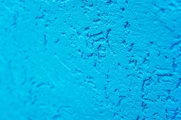 blue cement wall, building facade as a color relief texture close-up, copy space