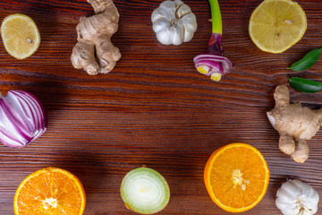 Healthy products for Immunity boosting and cold remedieson wooden background
