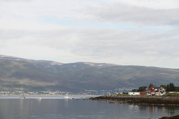 tromso troms&oslash;  water travel tourism sea coast nature port blue landscape sky harbor architecture europe boatship mountain summer bay view city beautifull and mark mediterranean vacation town