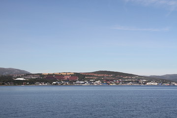 Fototapeta premium tromso tromsø water travel tourism sea coast nature port blue landscape sky harbor architecture europe boatship mountain summer bay view city beautifull and mark mediterranean vacation town