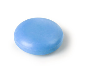 Round blue bar of soap, isolated on white background
