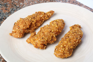 pollo rebozado con maiz