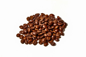 Arabica and Robusta coffee beans on a white background