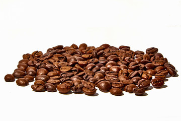 Arabica and Robusta coffee beans on a white background