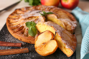 Apple taten on paper with honey and mint