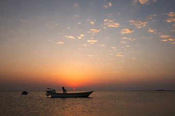 Speed boats during sunset at Busaiteen coast, Bahrain