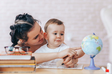 Fototapeta premium Education for children at home, education for children with parents, education for parents during quarantine, education for children during vacations, educational games for children with parents