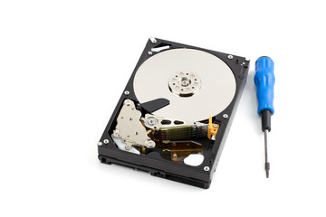 Mechanic tool and  Inside a hard drive with a data plate and a needle for reading and writing data,on white isolated background.