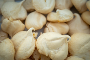 freshly baked meringue in a cookie tin