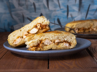 Hearty breakfast at home. Pie with chicken and cabbage and coffee in a large gray ceramic mug