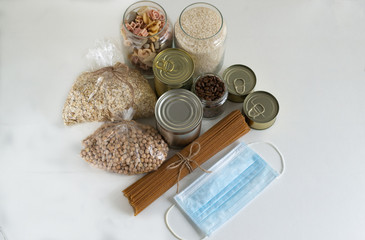 Stocks of various products that are stored for a long time, during quarantine. Coronavirus concept - stay home, be safe.