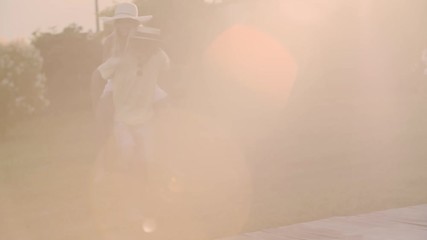 Group of friends enjoying summer time at swimming pool