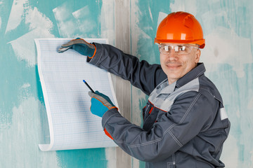 A person is an engineer, architect and inspector who works on a construction site to monitor, plan...