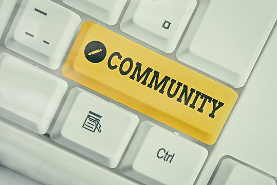 Conceptual hand writing showing Community. Concept meaning group of showing with a common characteristics living together