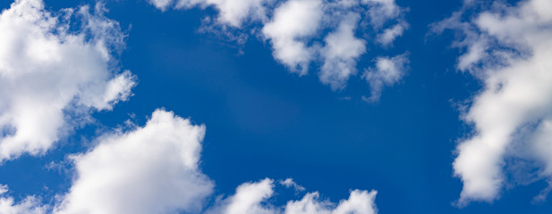 Naklejka na ściany i meble Blue sky with clouds background banner