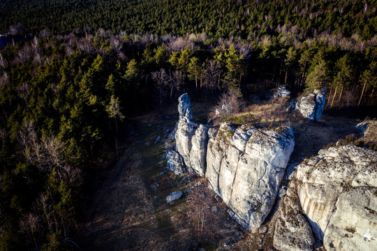 Top down view/ Aerial view over limestone rocks on the Mountain Kołoczek in Podlesice (Upland Cracow - Czestochowa, Wyzyna Krakowsko - Czestochowska), popular tourist place. During sunny early spring 