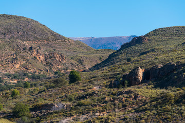 Fototapeta na wymiar mountainous landscape near the Beninar reservoir (Spain)