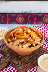 Baked sweet cinnamon apples with oatmeal flakes. Vegan healthy breakfast