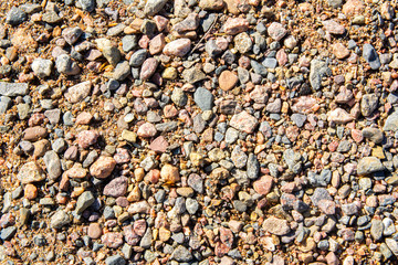 Small stones on the shore of the lake