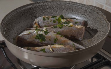 pan with frozen and coldito fish