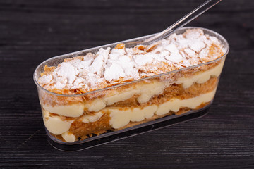 Pie with brew cream and gentle dough with sugar powder