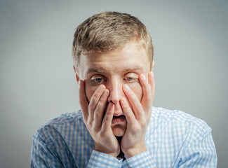 desperate businessman isolated on white background