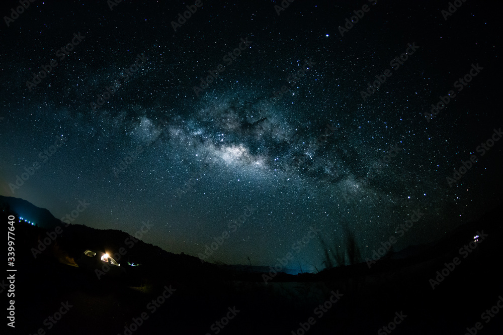 Wall mural backgrounds night sky with stars and milky way at thailand