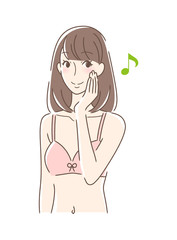 笑顔で頬を触る女性