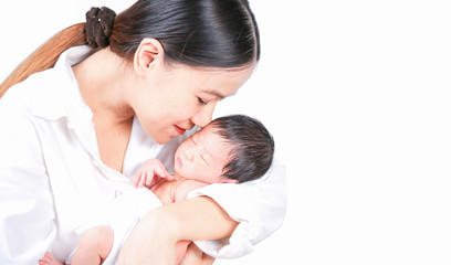 Mother day concept. The mother held the baby in her hand. Mom holding small baby. Woman hands holding newborn baby.