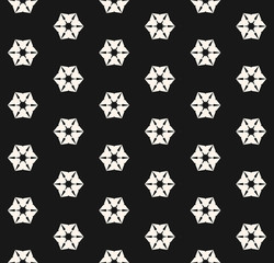 Vector geometric floral seamless pattern. Abstract minimal background in black and white colors. Graphic texture with flower shapes, hexagons, snowflakes. Dark monochrome repeat design for decoration
