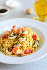 Tasty of Spaghetti with sea food on the plate - Close up. 