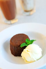 Beautiful tasty of chocolate Muffins with vanilla ice cream. Close up. 