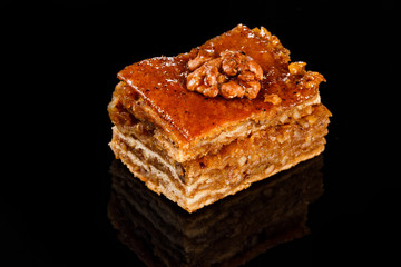 Walnut mini cake. Pastry for everyday breakfast. Black background