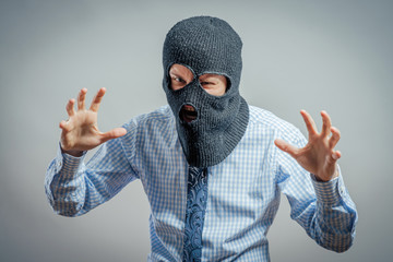aggressive man in the mask