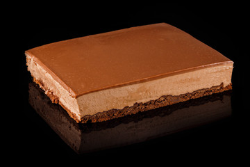 Chocolate and caramel Cheesecake. Art of sweets. Content for pastry shop and bakery. Traditional culinary.