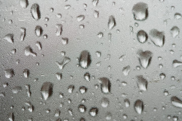 Water droplets on a glass. Background image.