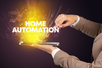 Close-up of a touchscreen with HOME AUTOMATION inscription, innovative technology concept