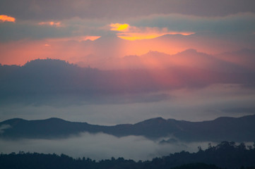 Fototapeta na wymiar sunrise and layer of hills. Taken at SABAH, BORNEO