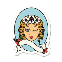 tattoo sticker with banner of a maiden with crown of flowers winking