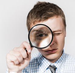 businessman with a magnifying glass