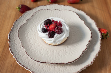 red fruit cheesecake on ceramic plate