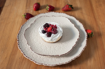 red fruit cheesecake on ceramic plate