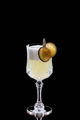 Lemon cocktail alcoholic with foam and lime chips