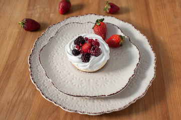 red fruit cheesecake on ceramic plate