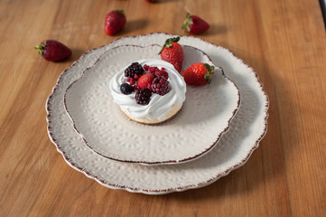 red fruit cheesecake on ceramic plate