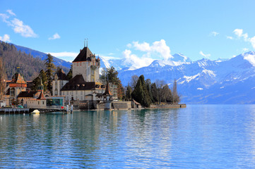 Obraz premium Oberhofen Castle from Lake Thun. Oberhofen town is located on the northern shore of Lake Thun. Switzerland, Europe.