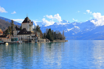 Oberhofen Castle from Lake Thun. Oberhofen town is located on the northern shore of Lake Thun....