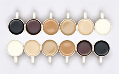 A conceptual shot with milk/tea/coffee in cups arranged in a manner which creates a gradient effect...
