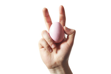 Egg in a hand on a white background. Painted egg